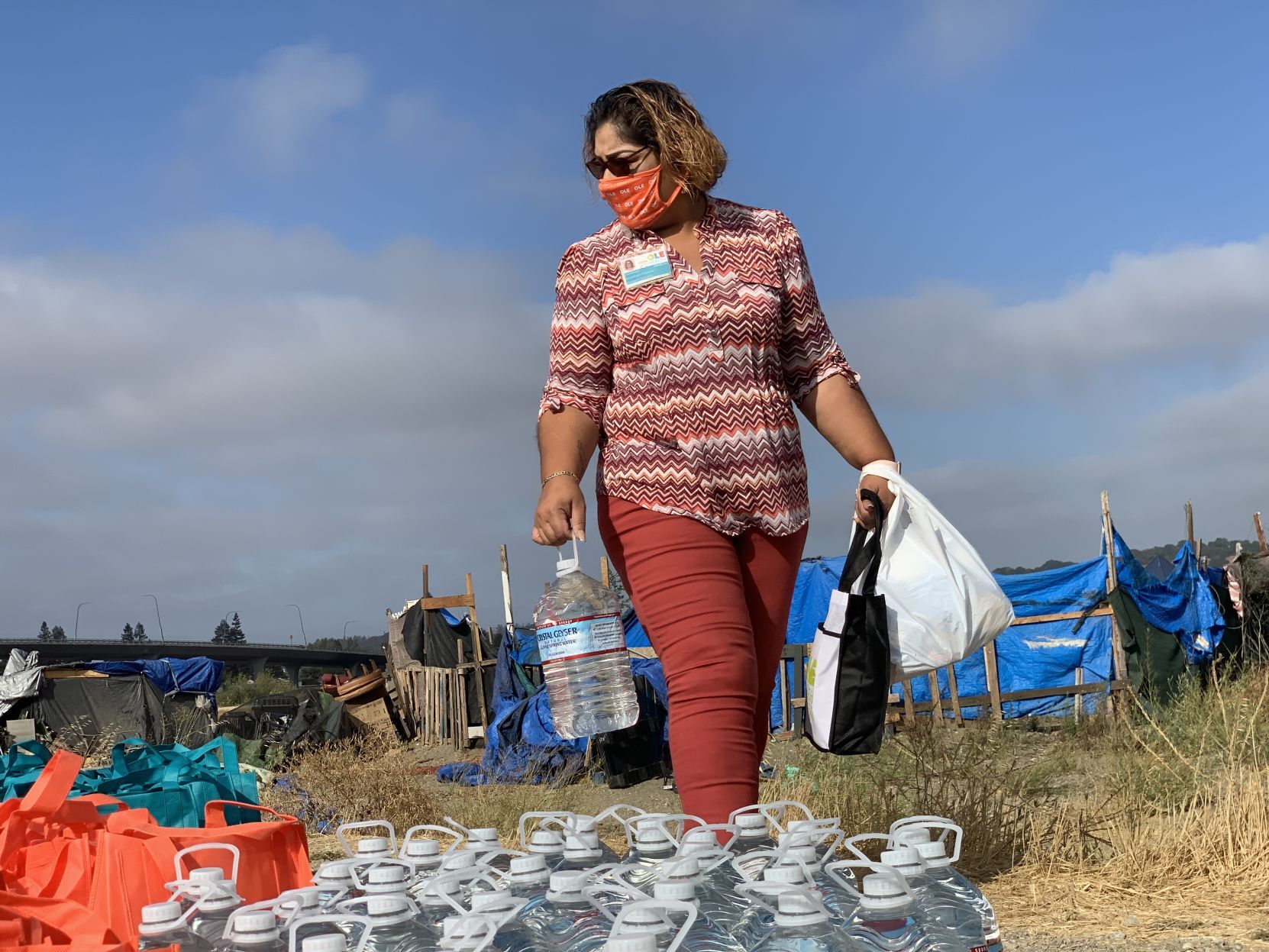 OLE Health distributes care bags to residents of the Bowl